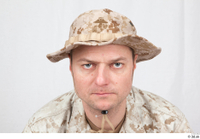  Photos Army Man in Camouflage uniform 13 21th century Army Desert uniform caps  hats head 0001.jpg